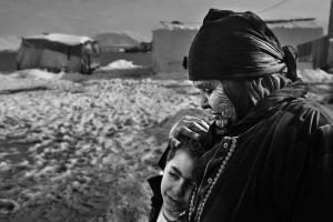 syrian-refugees-flooded-encampment-lebanon-ff