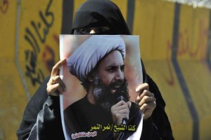 (FILE) A file picture dated 18 october 2014 shows a supporter of the Yemeni Shiite Houthi movement holding a banner depicting Saudi Shiite leader Nimr Baqir al-Nimr during a protest against the death sentence handed down upon al-Nimr by Saudi Arabia, outside the Saudi embassy, Sana'a, Yemen. Prominent Saudi Shiite cleric Nimr al-Nimr was among 47 people executed on 02 January 2016, after convictions on terrorism and incitement to violence charges, the Interior Ministry said in a statement. The executions were carried out after death sentences against the inmates were confirmed by the country's top court and ratified by King Salman, SPA said. Saudi Arabia, which applies a strict interpretation of Islamic law, is among the world's top executors.  ANSA/YAHYA ARHAB