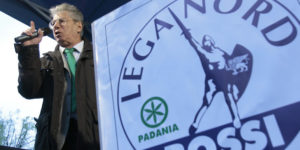 Lega Nord (North League) leader Umberto Bossi speaks on stage during a pre-election rally in downtown Milan April 11, 2008. Italy goes to the polls in a general election on April 13 and 14. REUTERS/Alessandro Garofalo (ITALY)