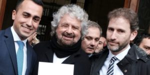 Five Star Movement (M5S) leader Luigi Di Maio (L) poses with movement's founders Beppe Grillo (C) and Davide Casaleggio (R) outside the Interior Ministry on January 19, 2018 after they registered their logo for the upcoming general elections to be held on March 4, 2018.  / AFP PHOTO / ANDREAS SOLARO        (Photo credit should read ANDREAS SOLARO/AFP/Getty Images)